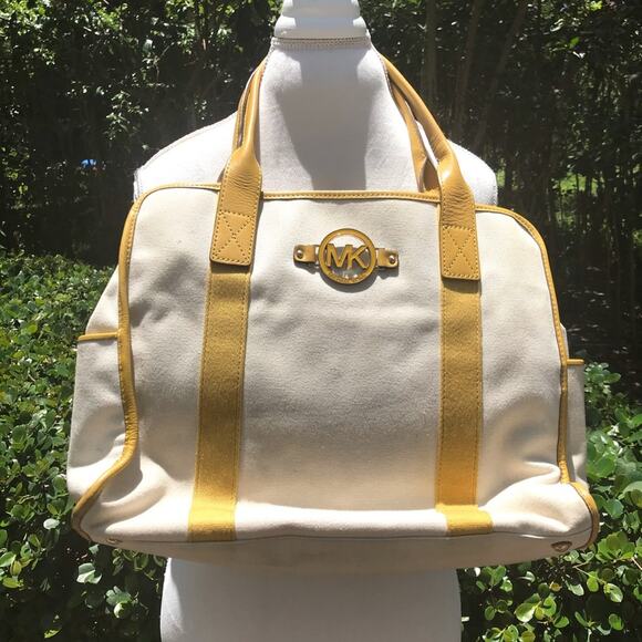 Michael Kors tan and yellow with MK emblem canvas tote - Picture 1 of 5